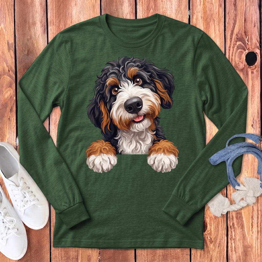Green long-sleeve shirt with a cheerful Bernese Mountain Dog puppy graphic.