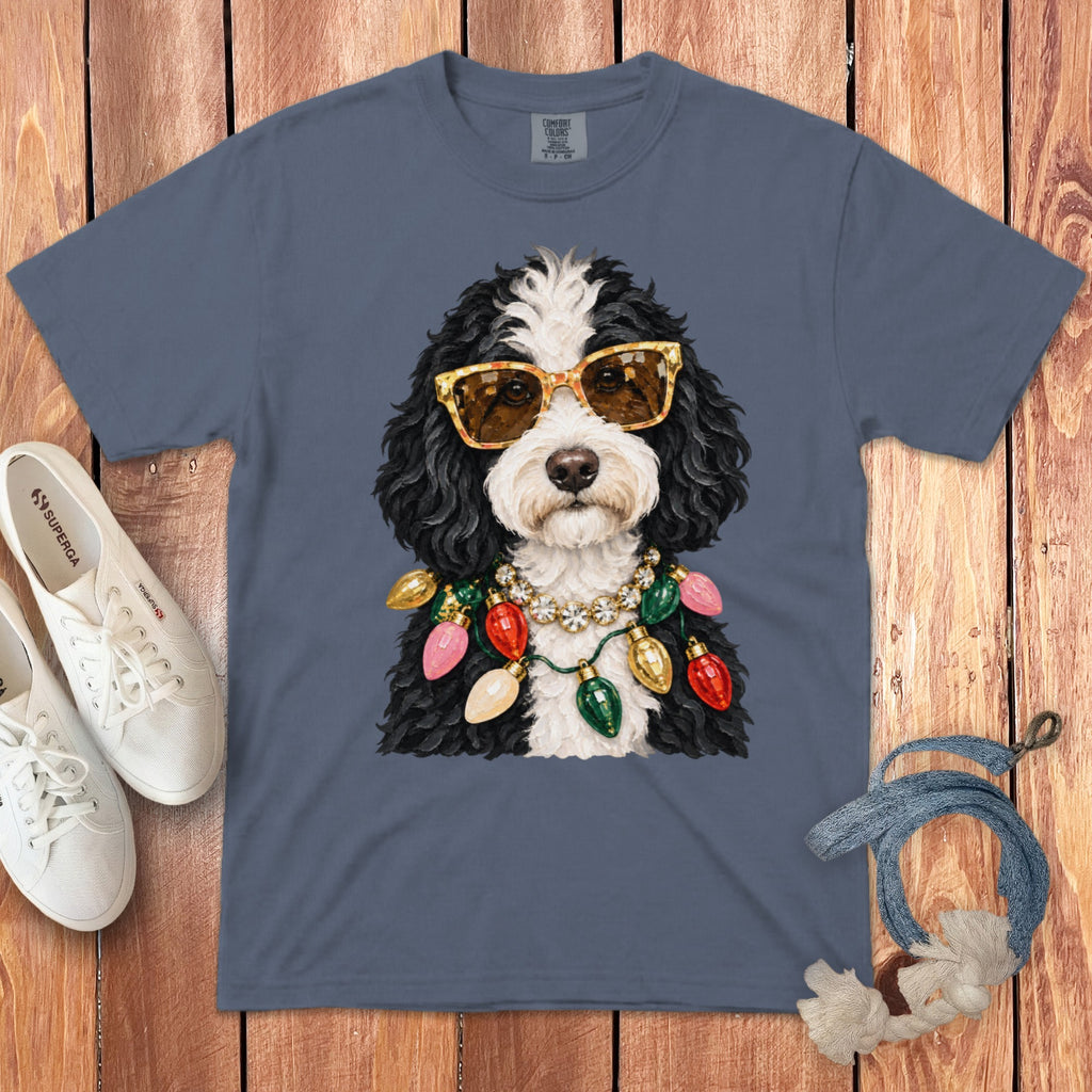 T-shirt with dog wearing sunglasses and Christmas lights necklace.