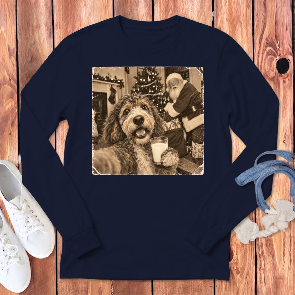 Dark blue long-sleeve shirt featuring a vintage-style graphic of a doodle dog holding a glass of milk with Santa Claus in the background.