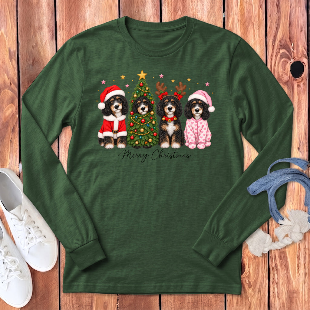 Dark green long-sleeved shirt with a graphic of four doodle dogs celebrating Christmas and Merry Christmas text.