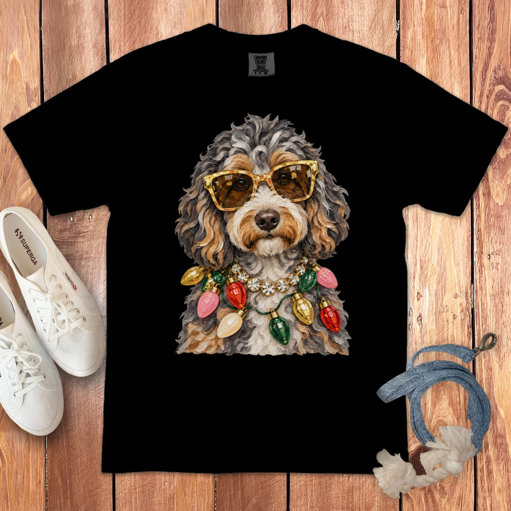 Black t-shirt with a fluffy dog wearing sunglasses and a Christmas light necklace.