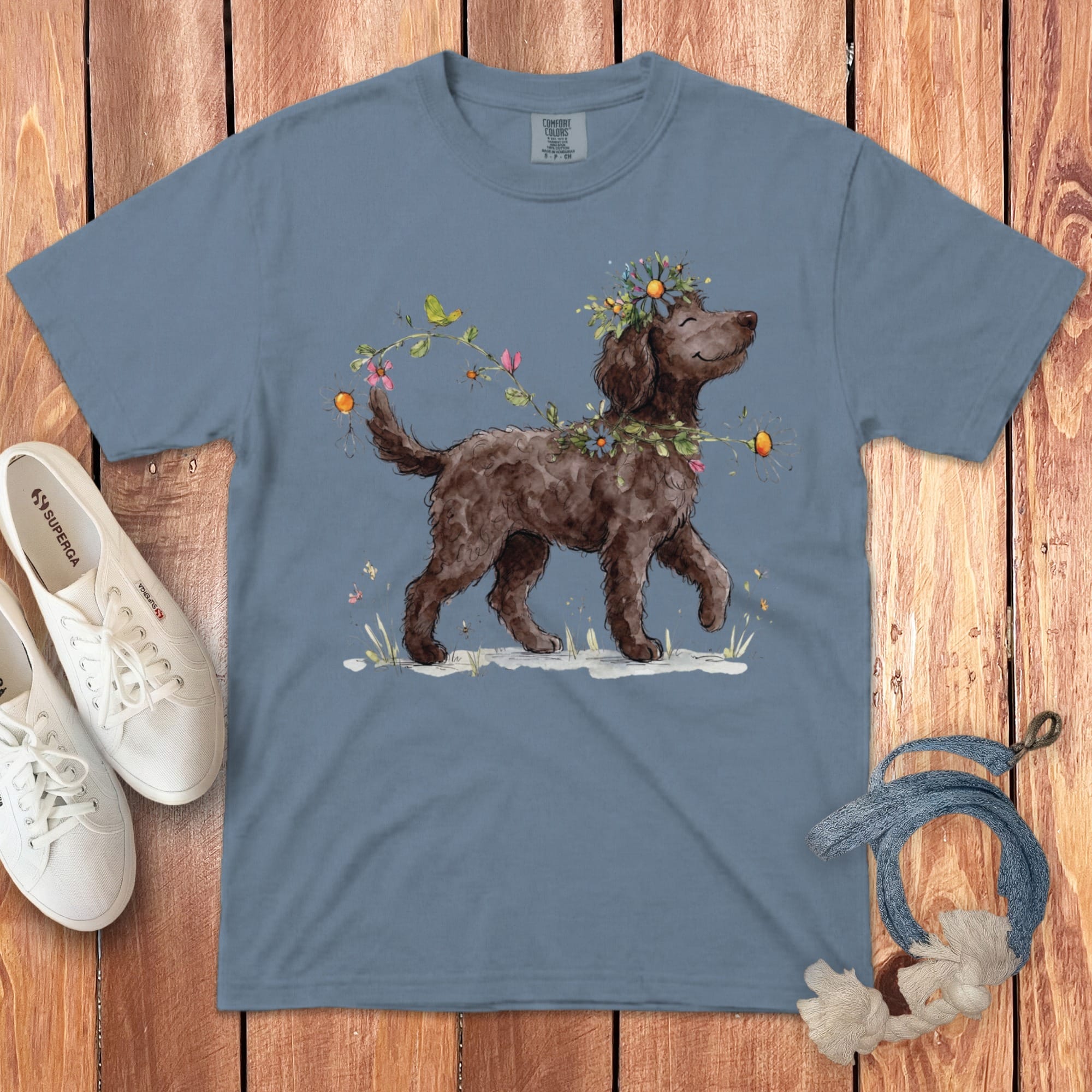 Watercolor illustration of a brown dog with flowers and a bird, wearing a flower crown.