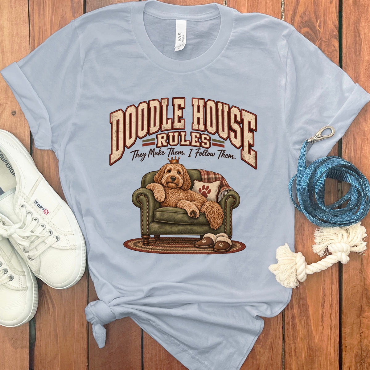 Light blue t-shirt with "Doodle House Rules" and dog on couch graphic.