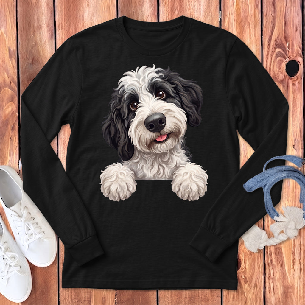Black long-sleeve t-shirt with a digital painting of a black and white fluffy dog.