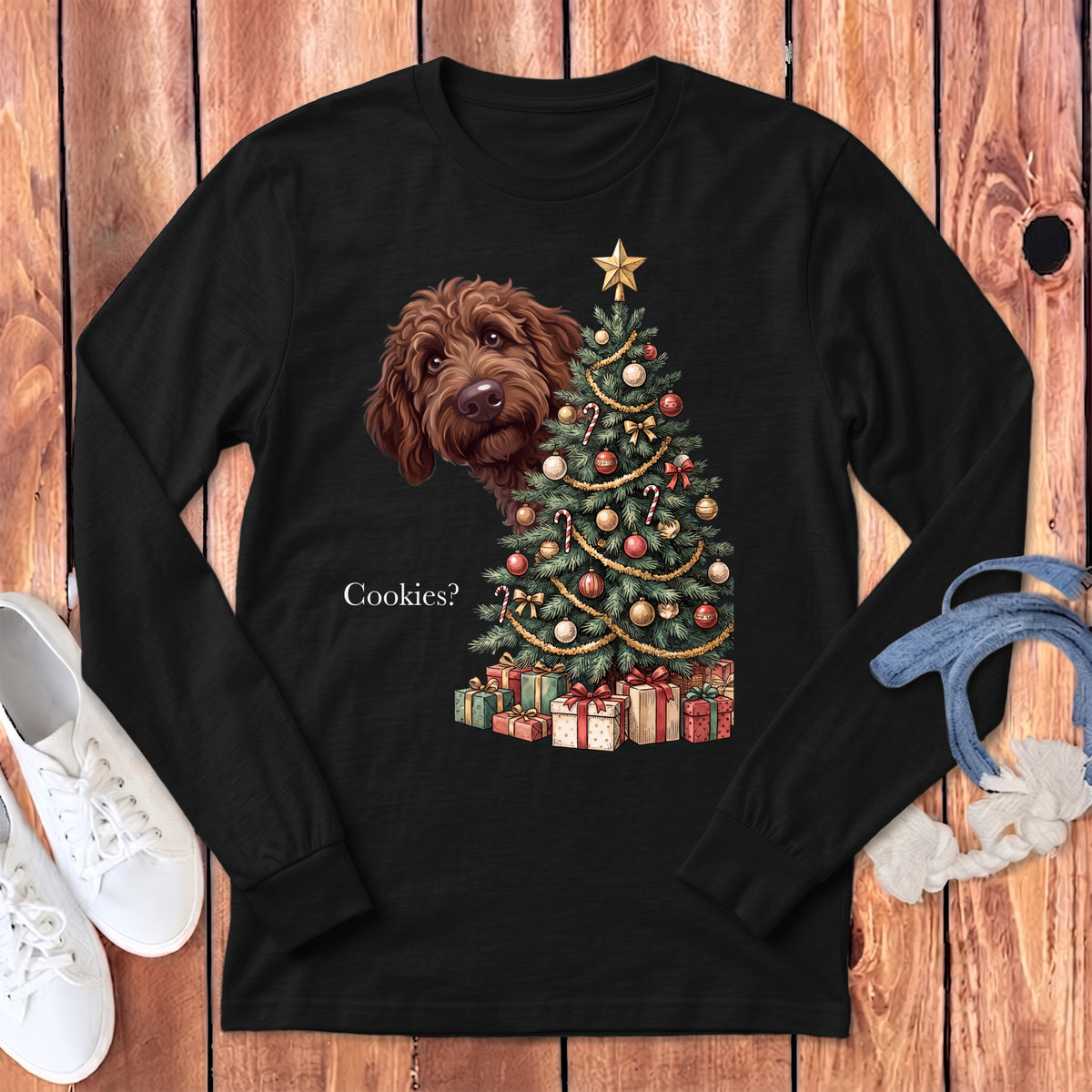 Brown dog peeking at a decorated Christmas tree with presents and the text "Cookies?".