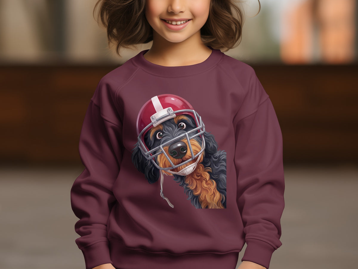 Maroon sweatshirt featuring a dog wearing a red football helmet.