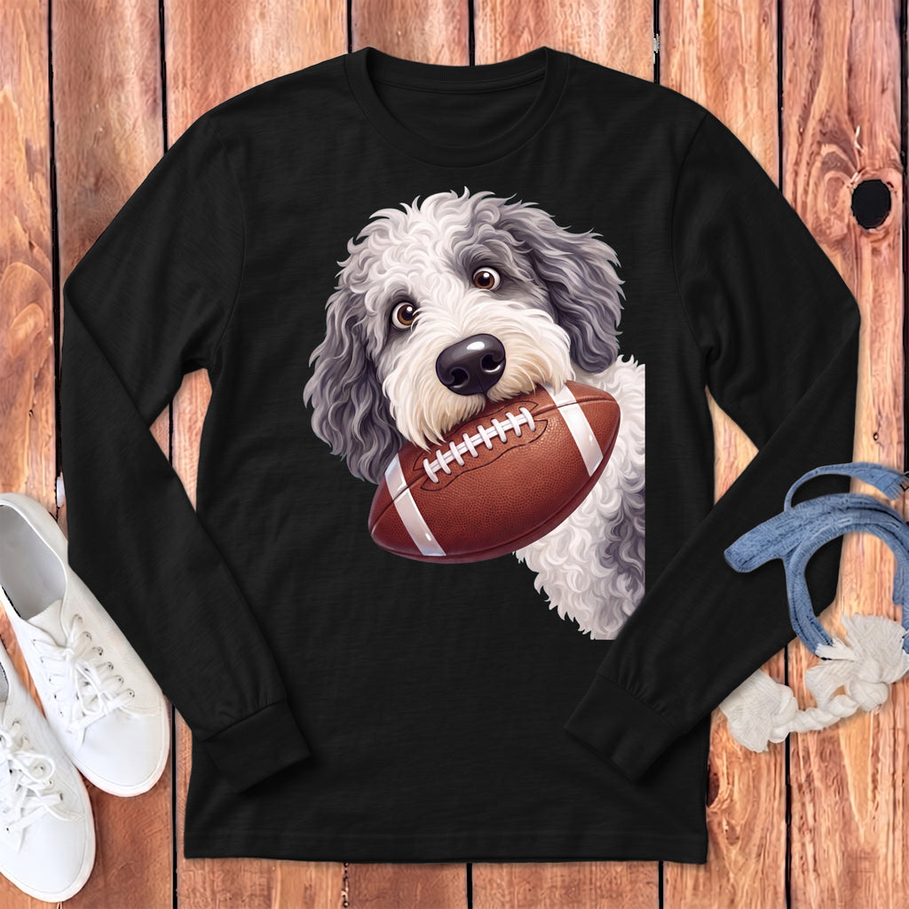 Black long-sleeve shirt with illustration of a dog holding a football.