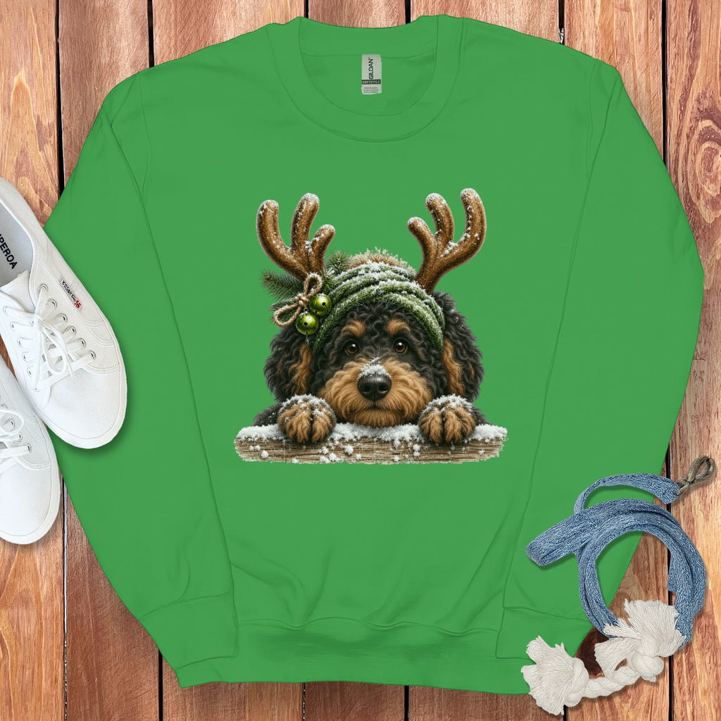 Green sweatshirt with a Christmas-themed doodle of a dog wearing antlers and a hat.