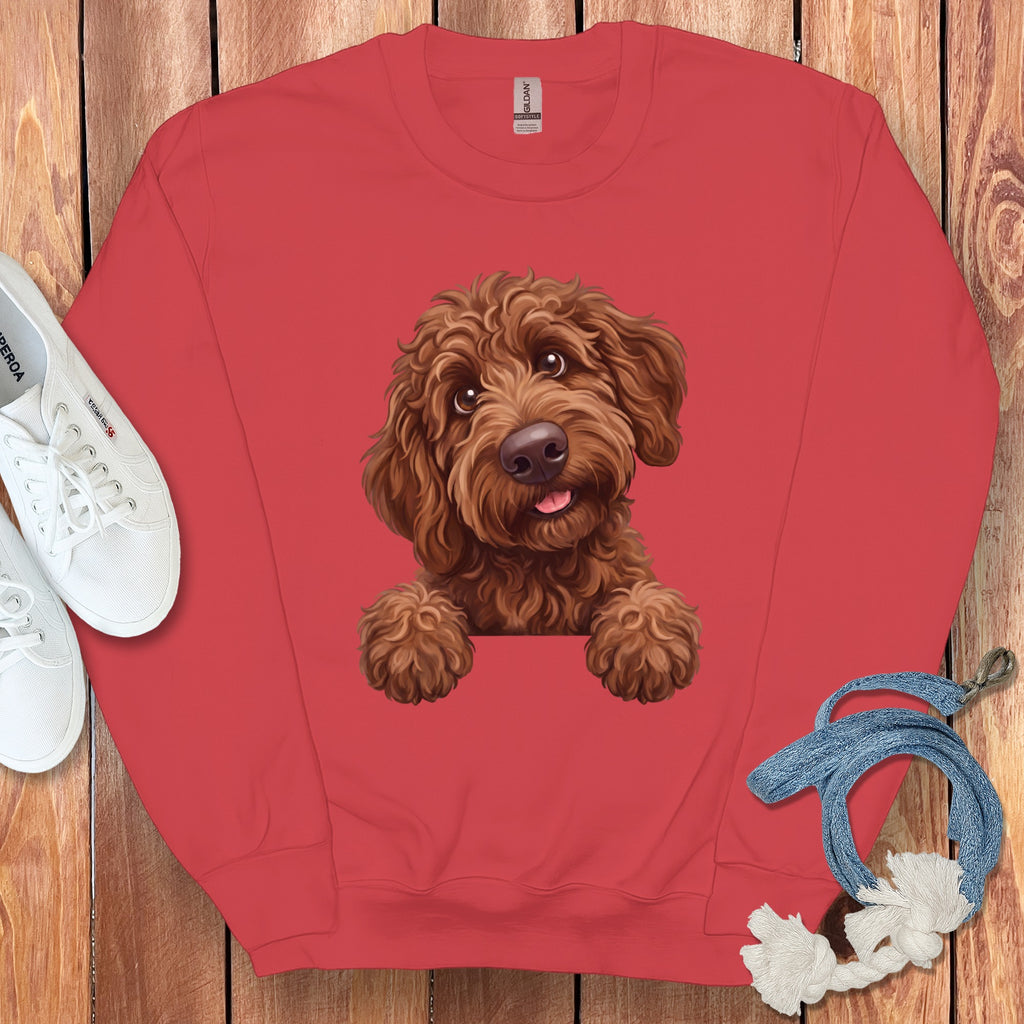Red sweatshirt with a brown doodle dog graphic and a Gildan tag.