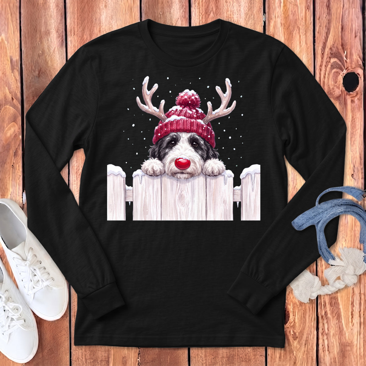 Black long-sleeve shirt with dog wearing a Santa hat and reindeer antlers.