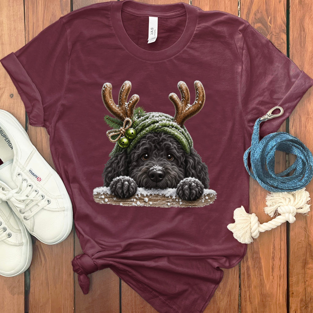 Maroon t-shirt with a black dog wearing reindeer antlers and a winter hat.