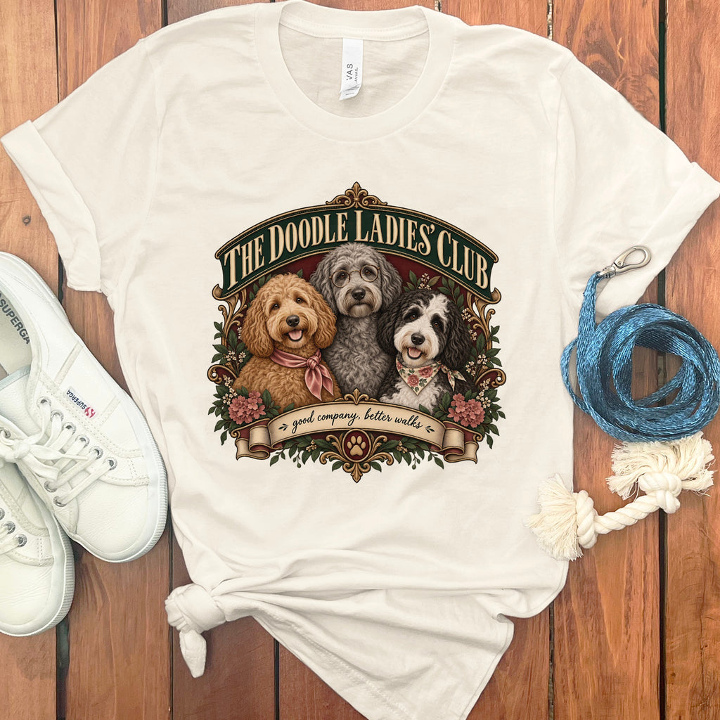 Cream t-shirt with "The Doodle Ladies' Club" and three doodles.