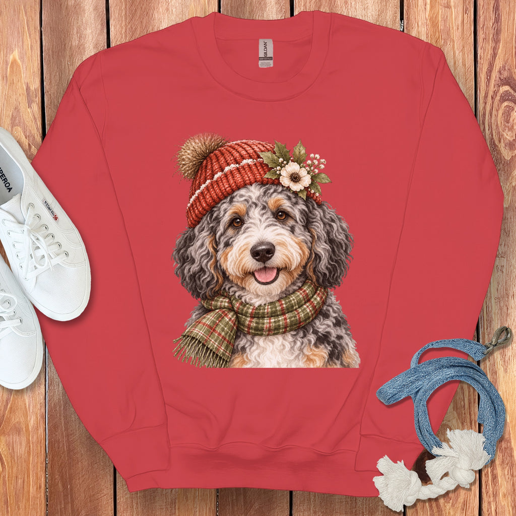 Crewneck sweatshirt with a printed image of a dog wearing a winter hat and scarf.