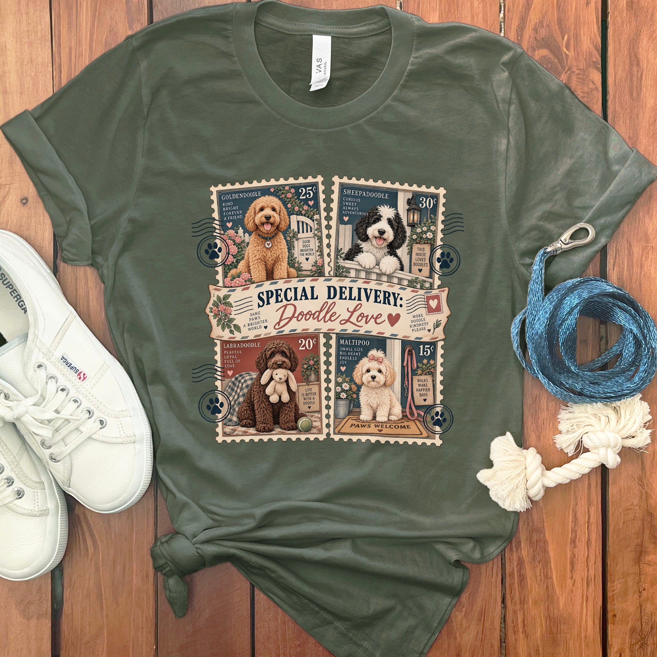 Green t-shirt with "Doodle Love" stamp design featuring Goldendoodle, Sheepadoodle, Labradoodle, and Maltipoo.