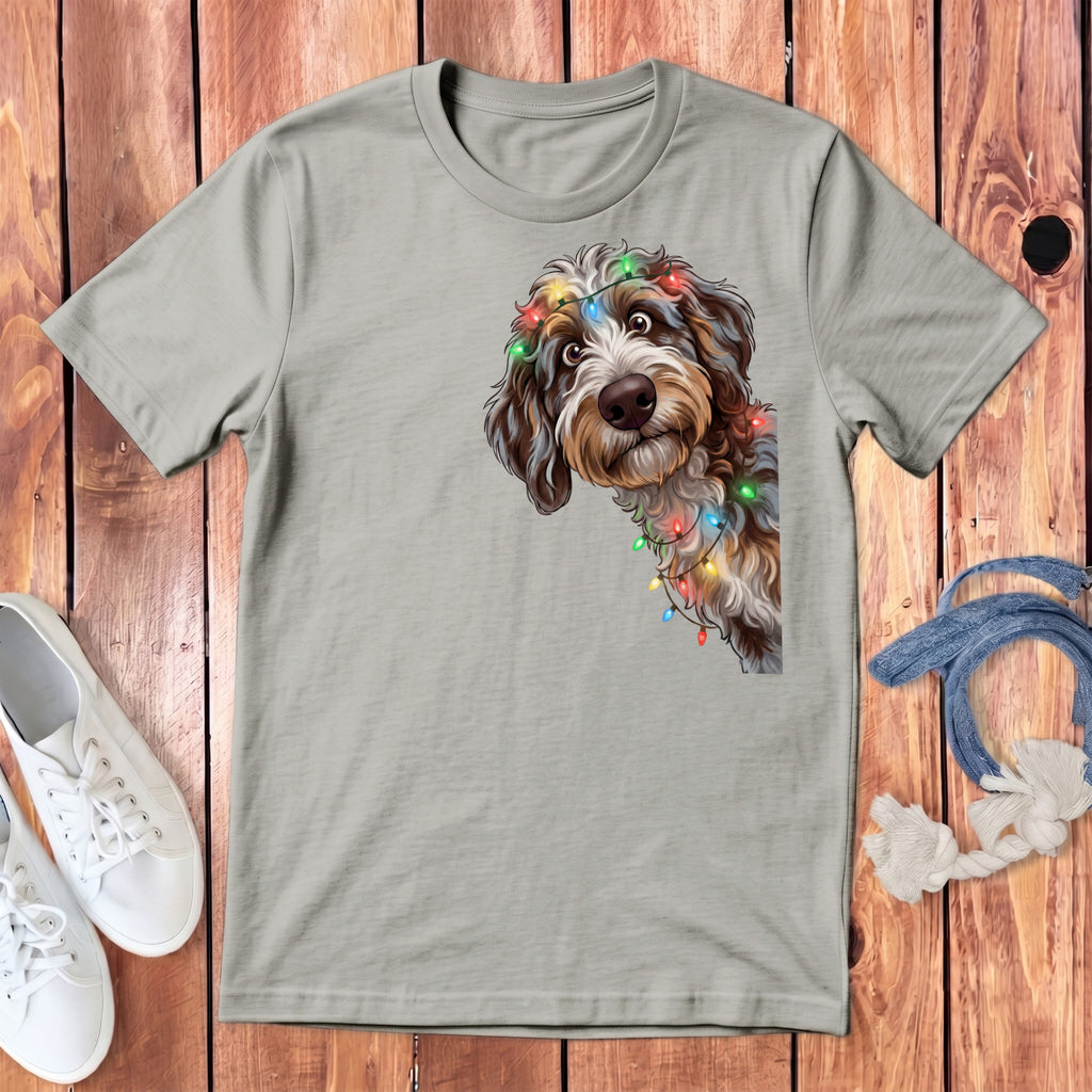 Light grey t-shirt with a doodle dog adorned with colorful Christmas lights.