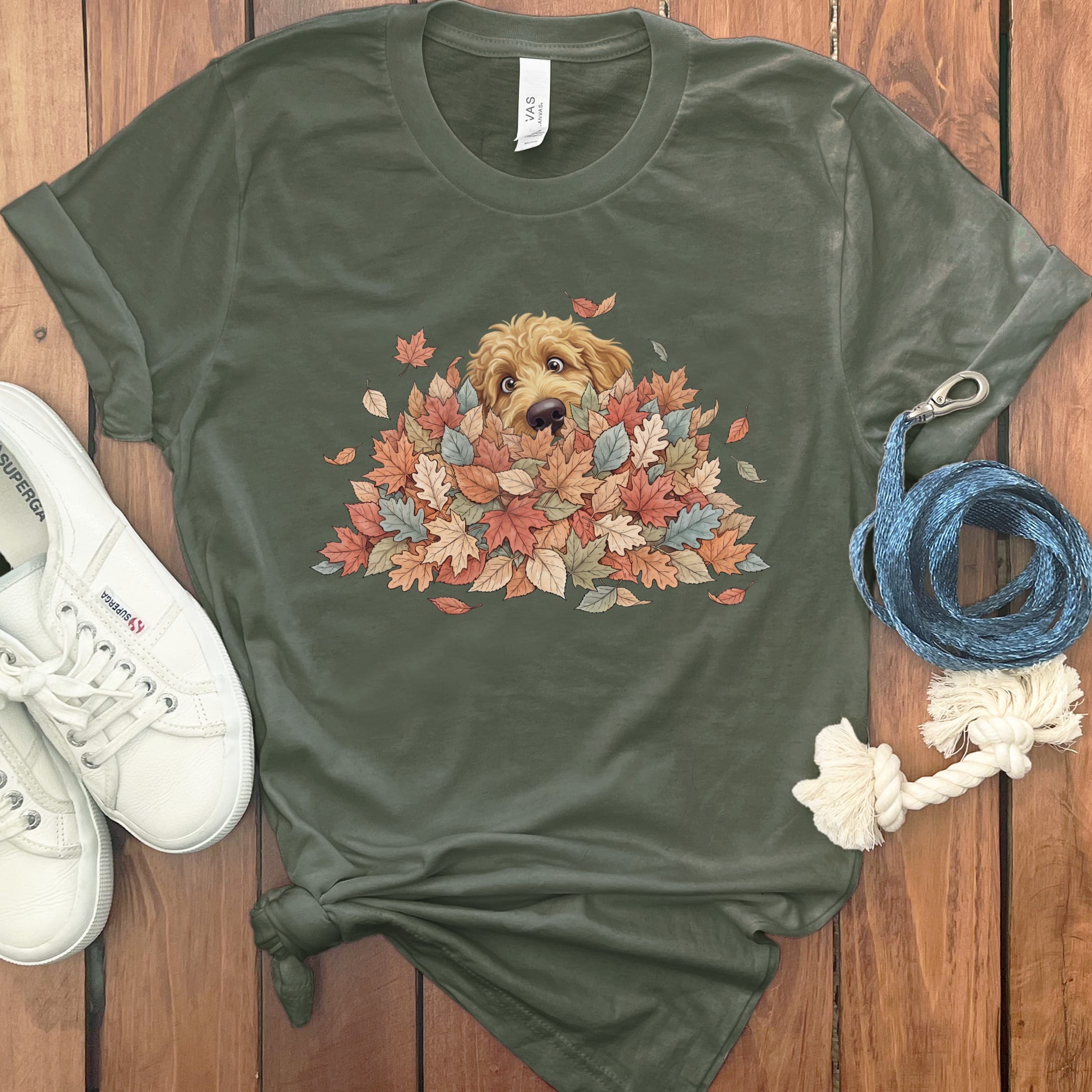 Apricot Goldendoodle Peeking Leaf Pile T-Shirt in Military Green / S by Puppy Jo