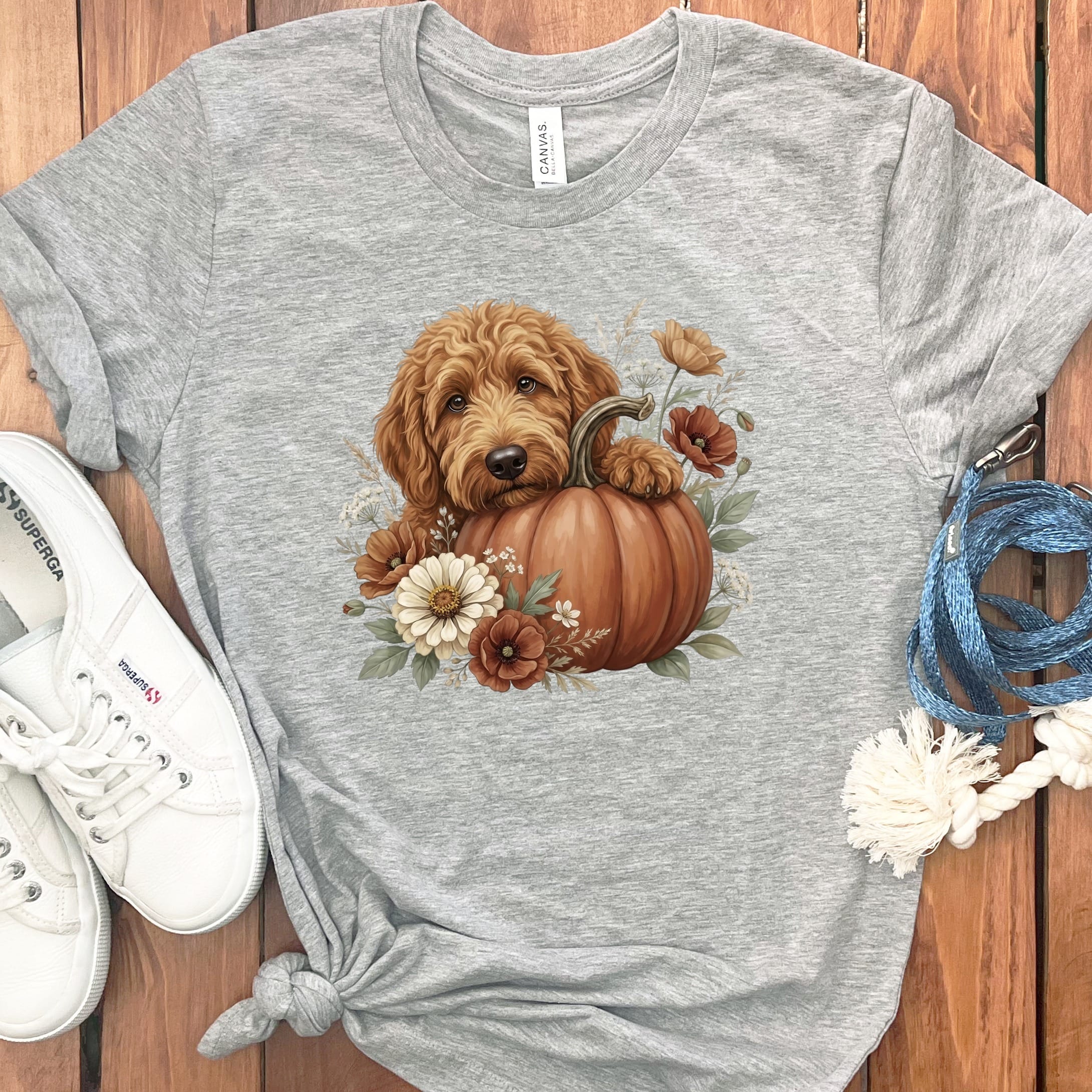 Apricot Goldendoodle Pumpkin Hug T-Shirt in Athletic Heather / S by Puppy Jo