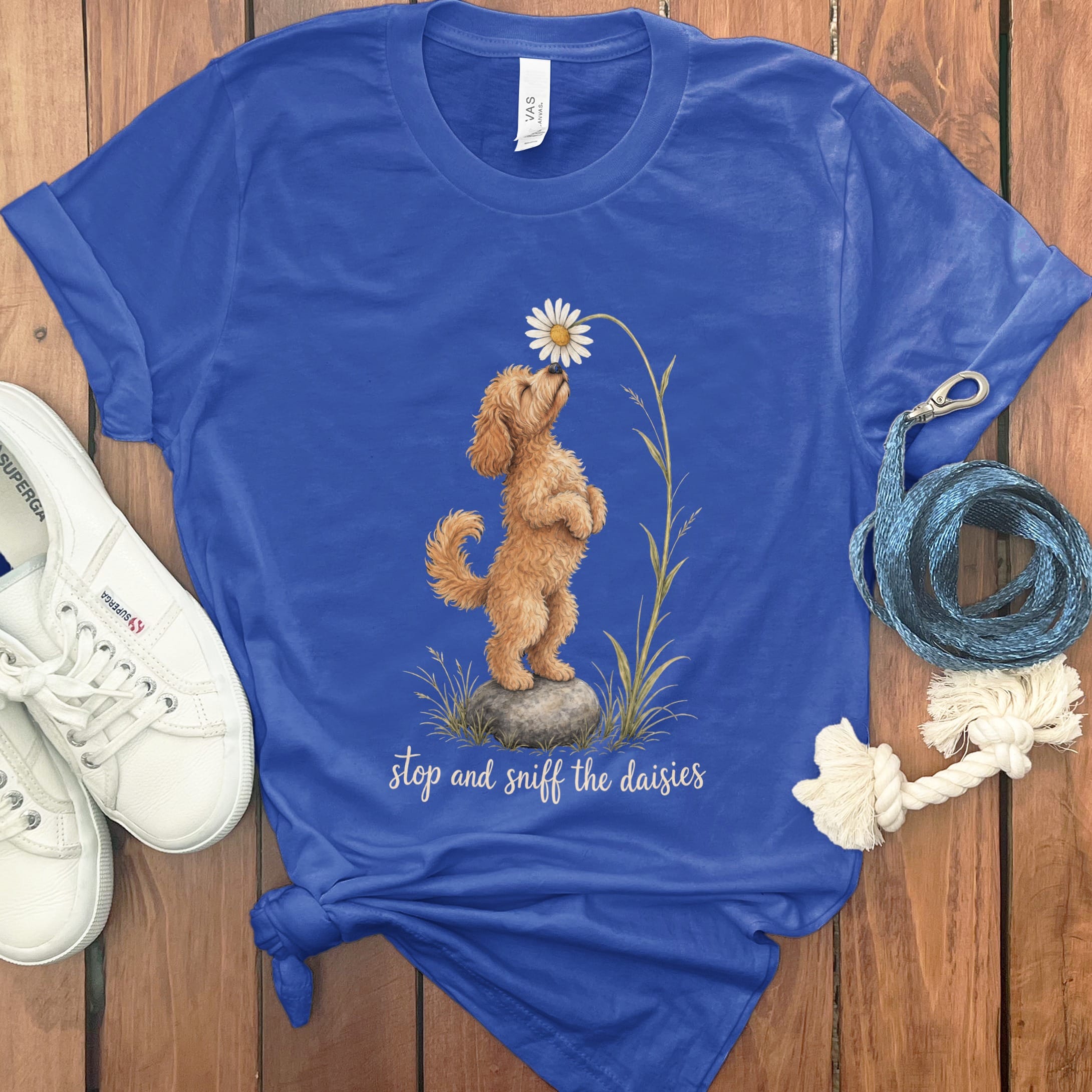 Apricot Goldendoodle Sniff Daisies T-Shirt in S / True Royal by Puppy Jo