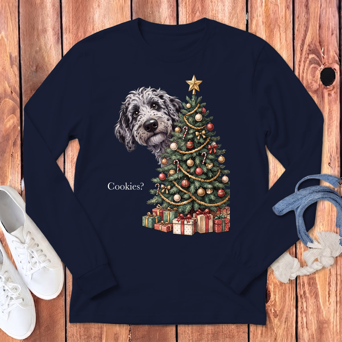 Dog peeking behind Christmas tree with presents and text "Cookies?".