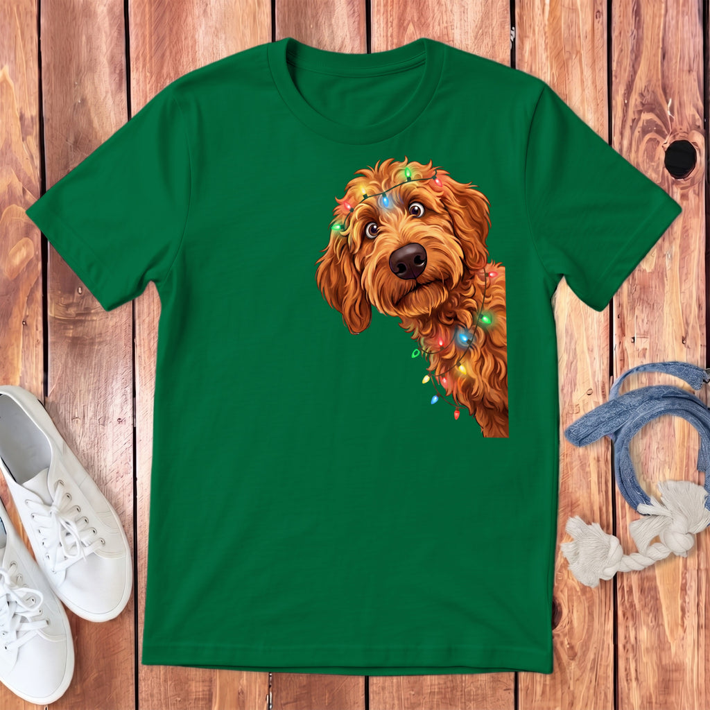 Green t-shirt with a fluffy dog wearing colorful Christmas lights.