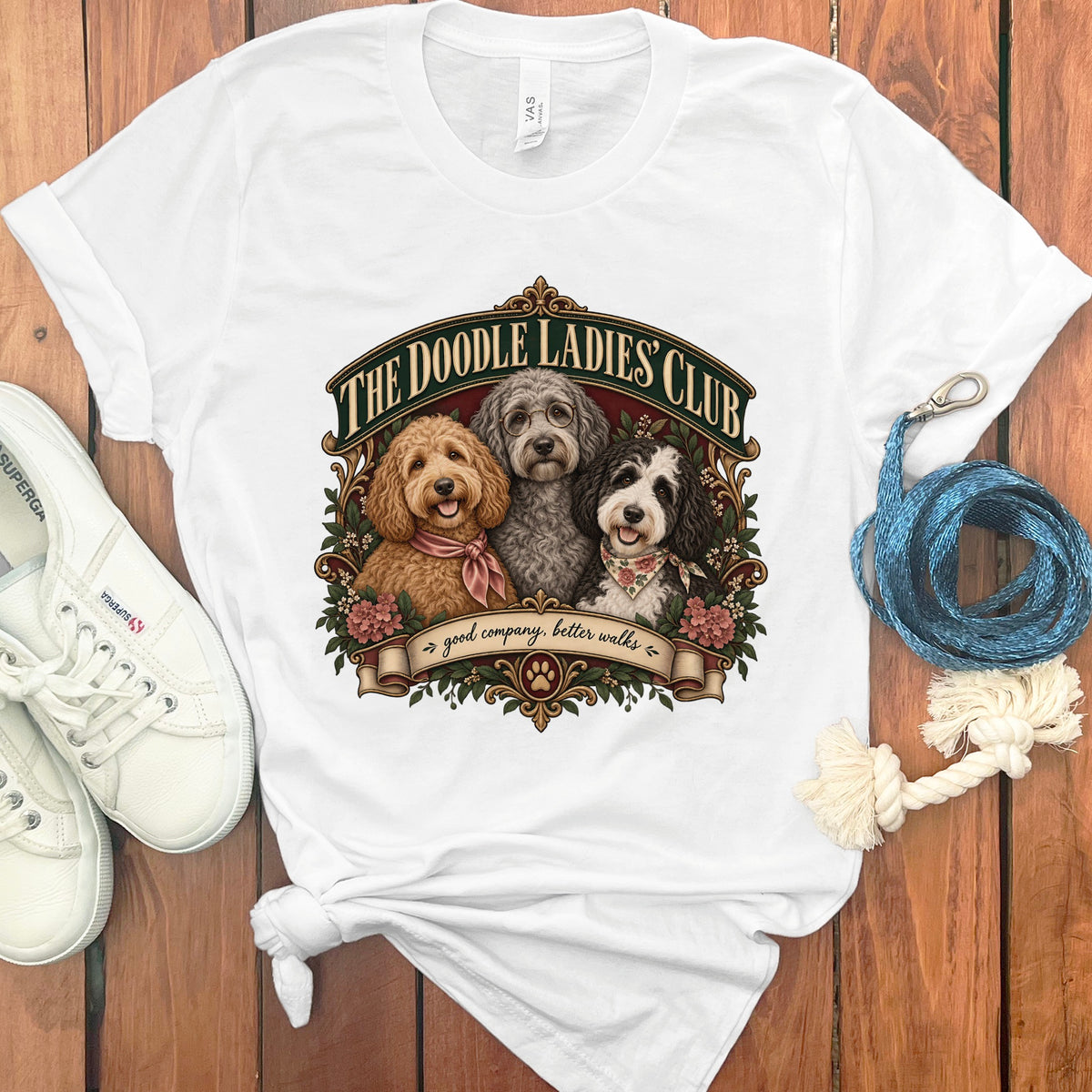 White t-shirt with "The Doodle Ladies Club" and three dogs, good company better walks text.