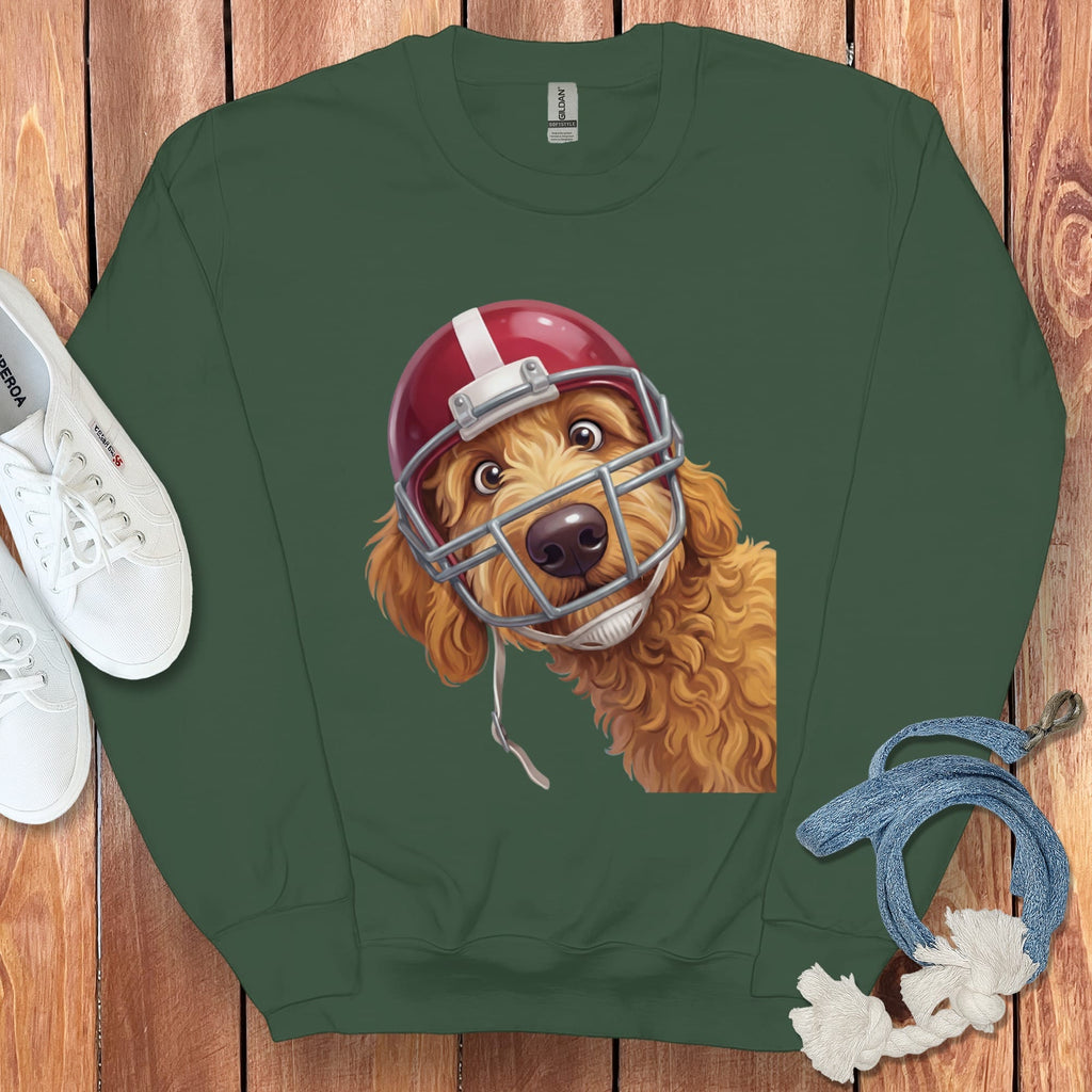 Green crewneck sweatshirt with a cartoon dog wearing a red football helmet.