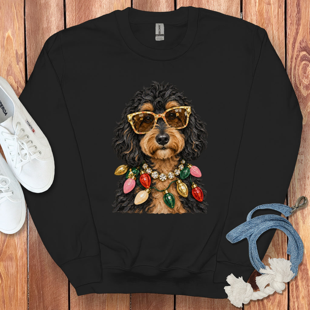 Black crewneck sweatshirt with a doodle dog wearing sunglasses and a Christmas light necklace.