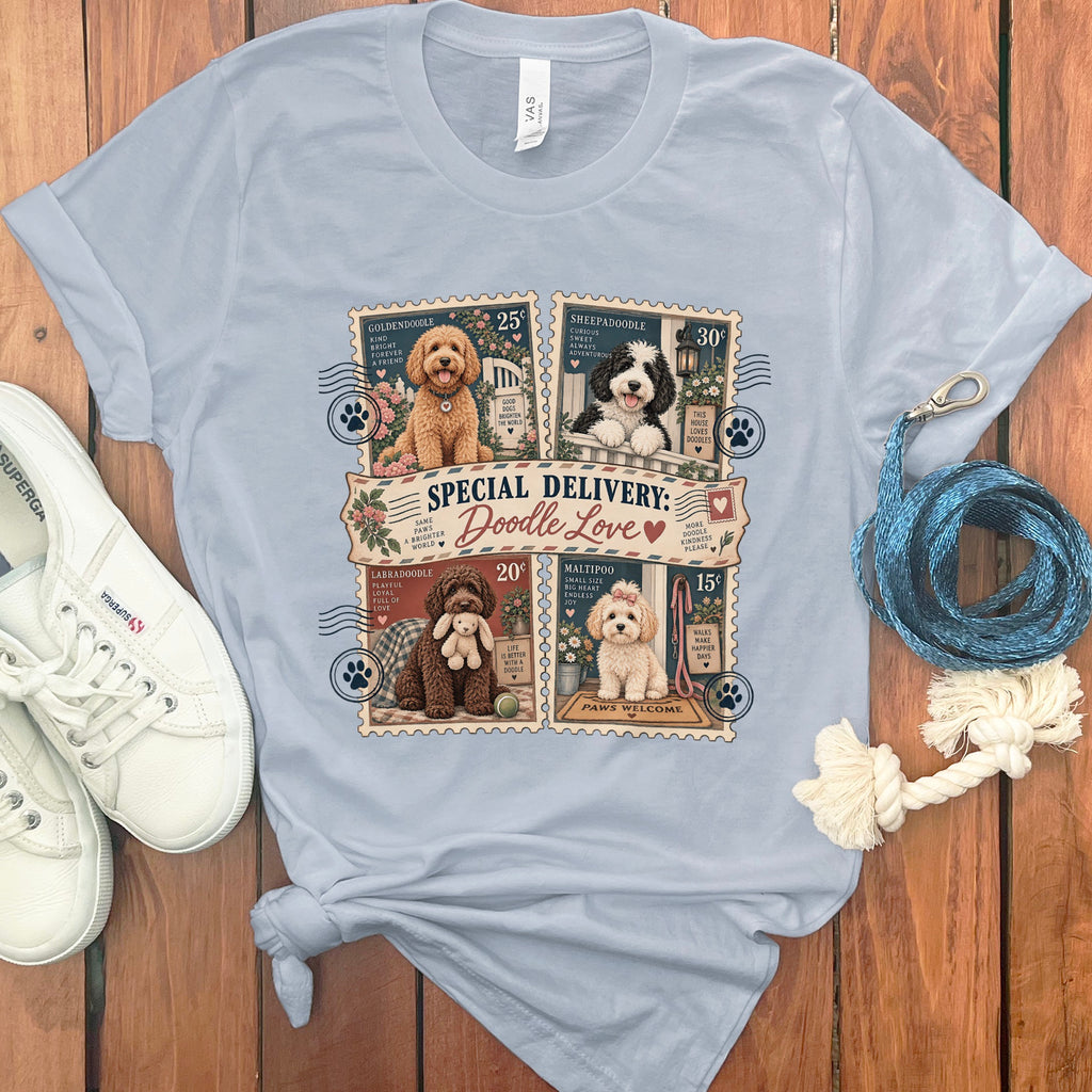 Light blue t-shirt with "Special Delivery: Doodle Love" featuring four postage stamps of different doodles.