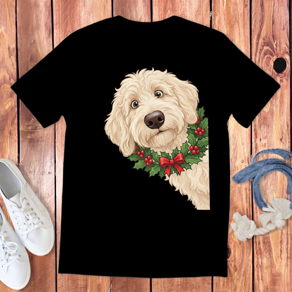 Black t-shirt with a cream-colored doodle dog wearing a holly wreath and red bow.