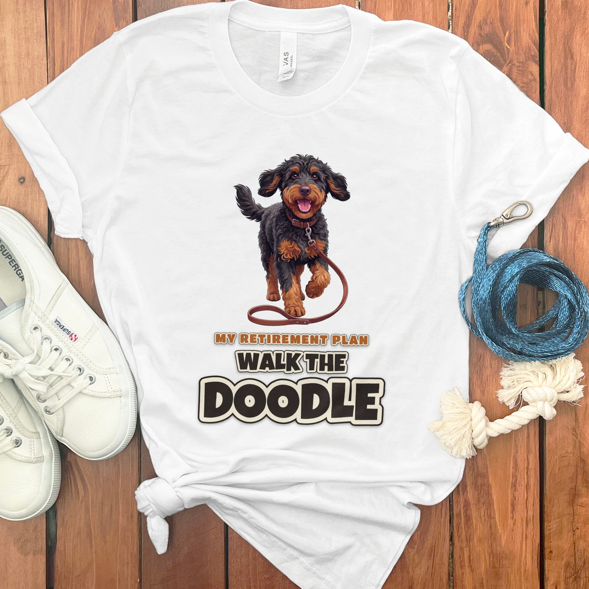 White t-shirt with a doodle dog graphic and text "My Retirement Plan Walk the Doodle".