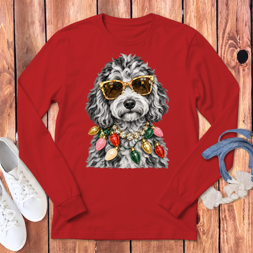 Red long-sleeve shirt featuring a doodle dog wearing sunglasses and a Christmas light necklace.