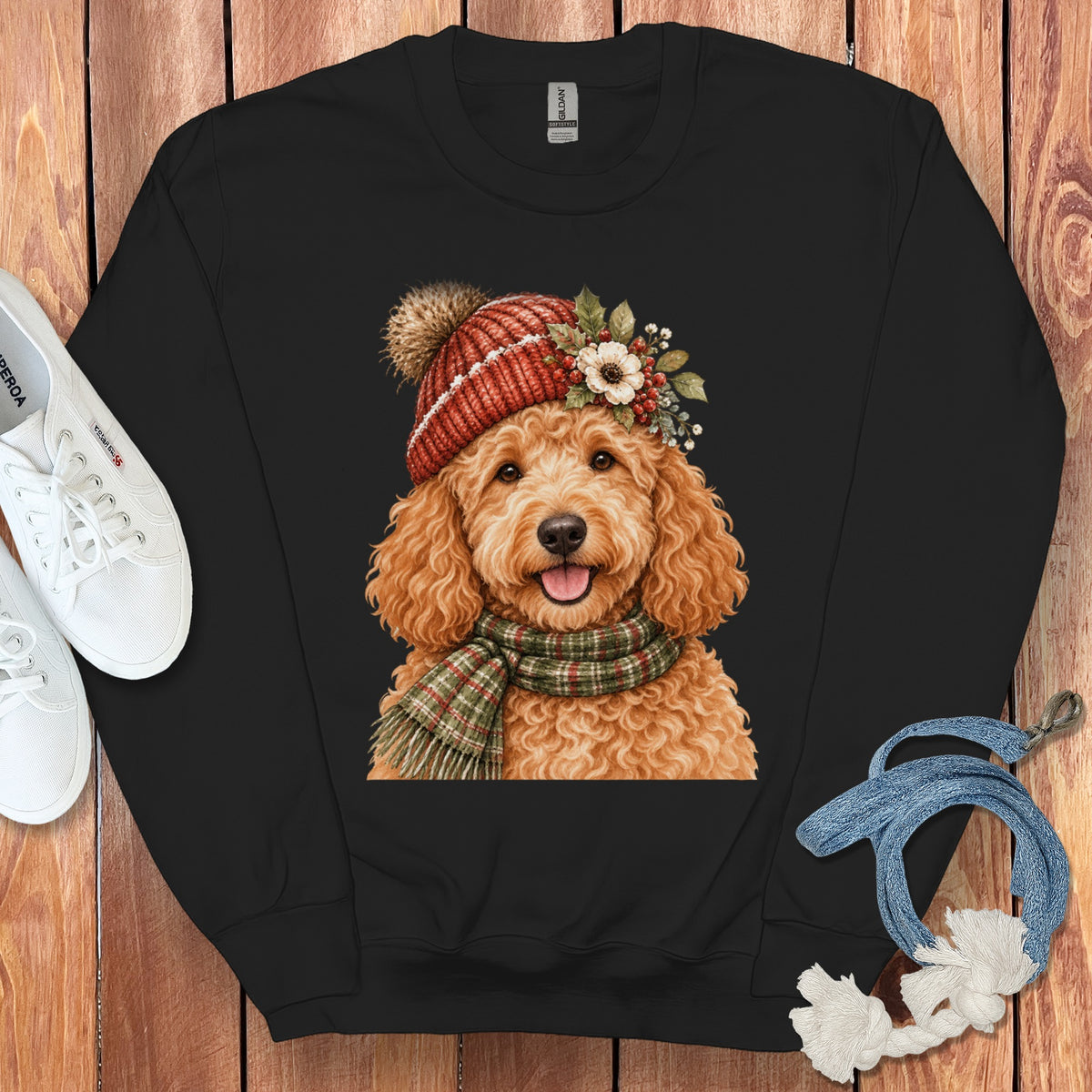 Black sweatshirt with watercolor art of a goldendoodle wearing a beanie and scarf.