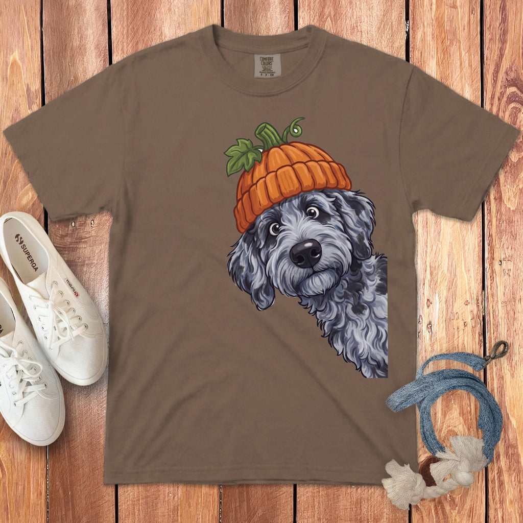 Brown t-shirt with a doodle dog wearing a pumpkin hat illustration.