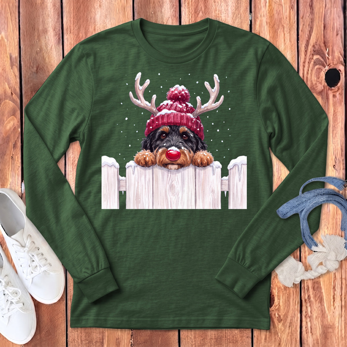 Green long-sleeve shirt with a dog wearing a Santa hat and red nose.