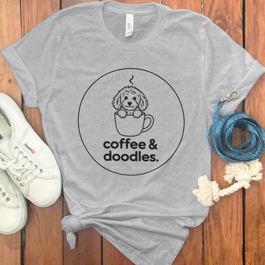 Gray t-shirt with "coffee & doodles" and a doodle in a coffee cup.