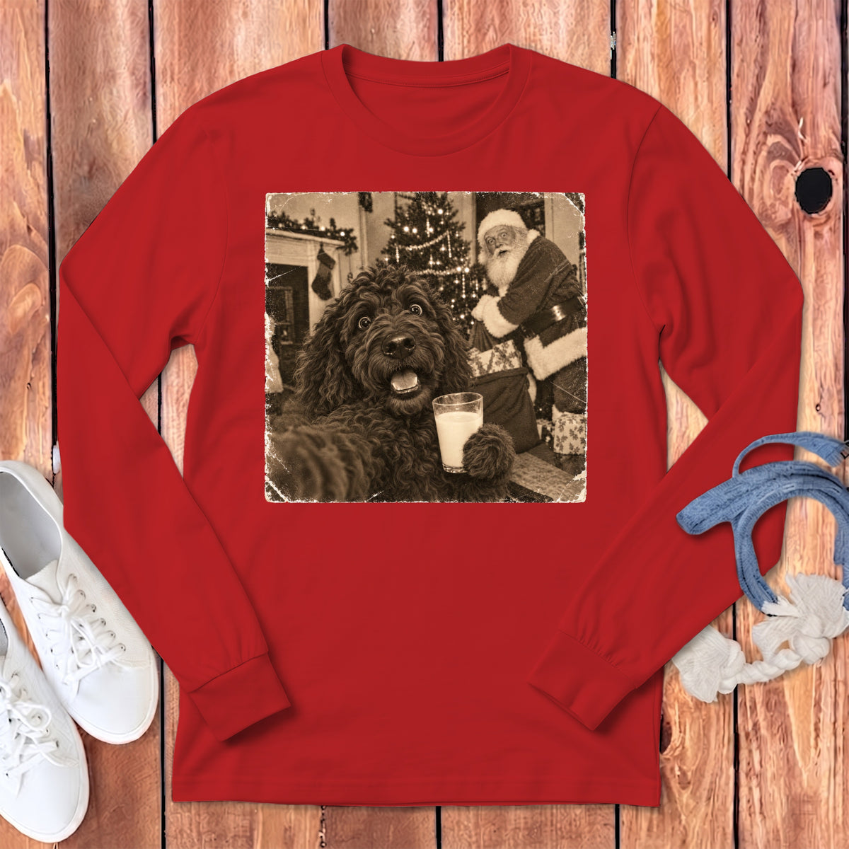 Red long-sleeve t-shirt featuring a vintage sepia graphic of a dog holding a glass of milk with Santa Claus in the background.