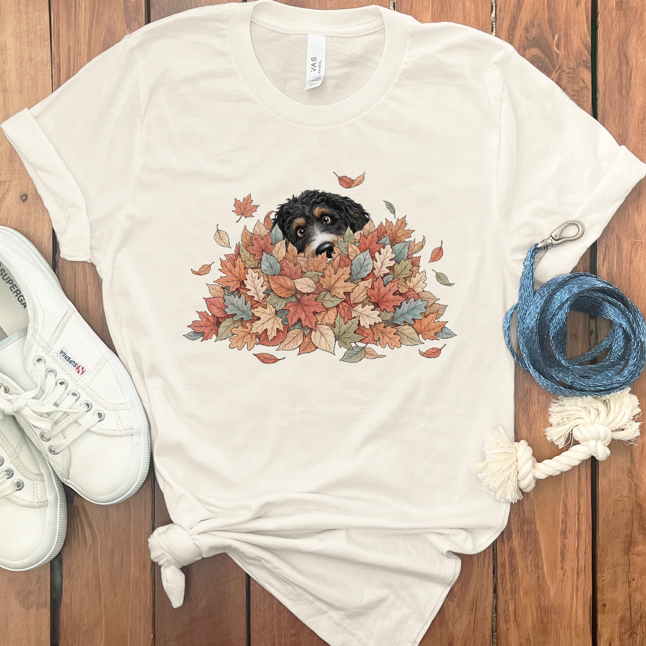 Bernedoodle Peeking Leaf Pile T-Shirt in Natural / S by Puppy Jo