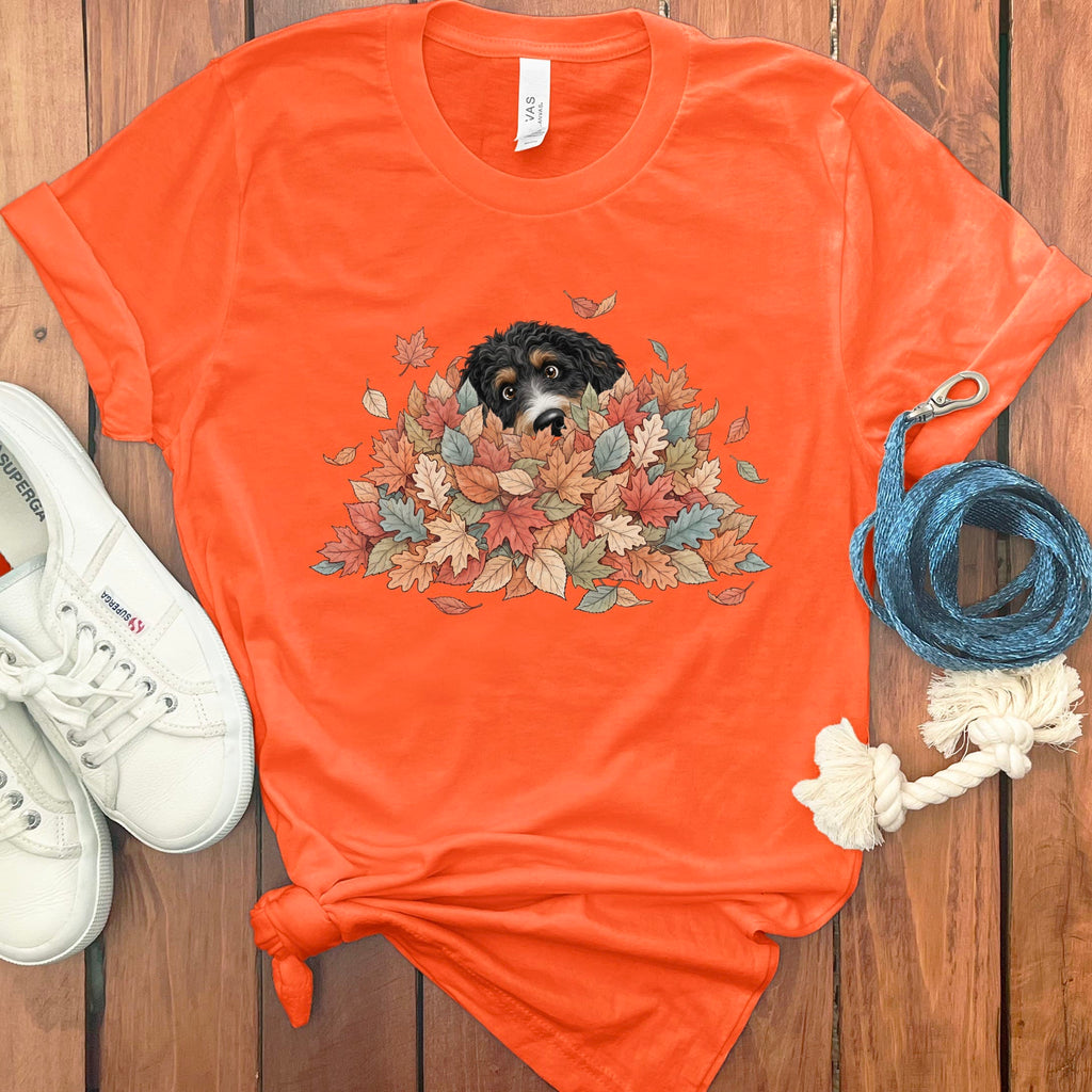 Bernedoodle Peeking Leaf Pile T-Shirt in Orange / S by Puppy Jo
