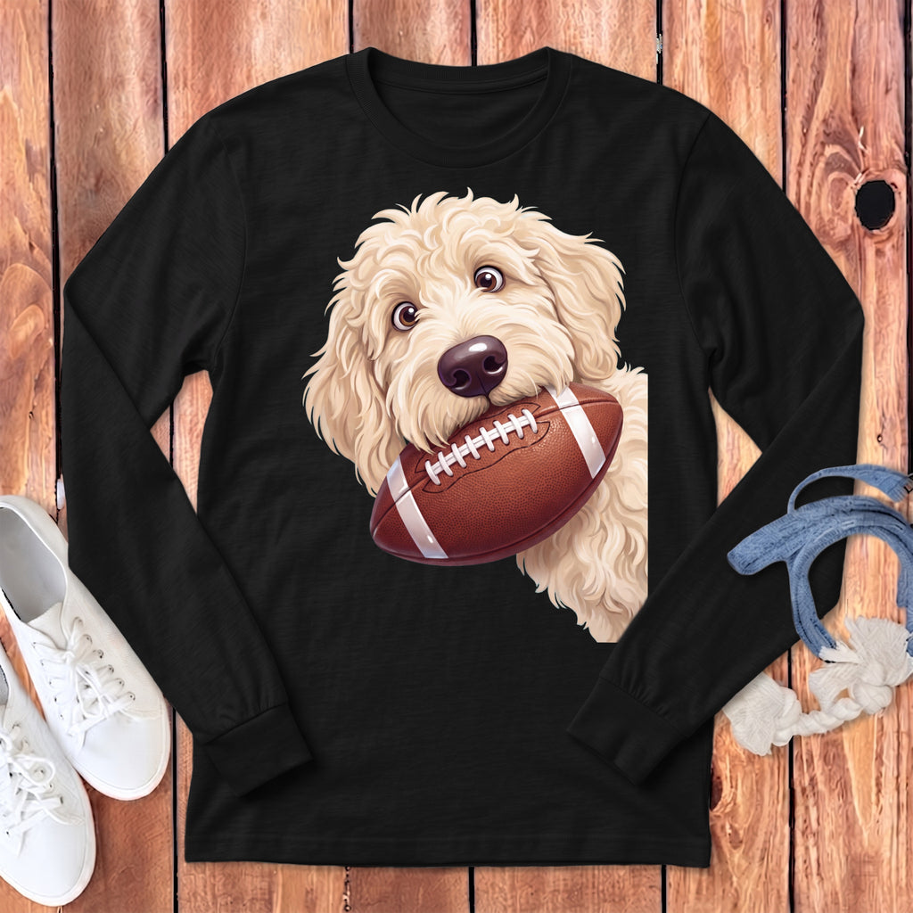 Black long-sleeve shirt with a light-colored doodle dog holding a football.