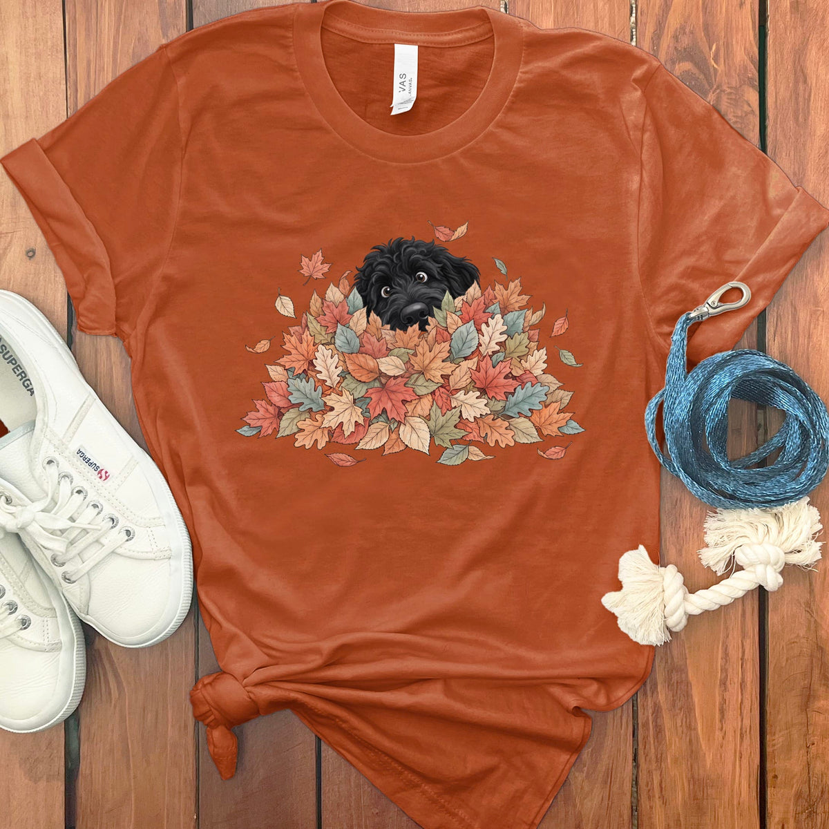 Black Goldendoodle Peeking Leaf Pile T-Shirt in S / Autumn by Puppy Jo