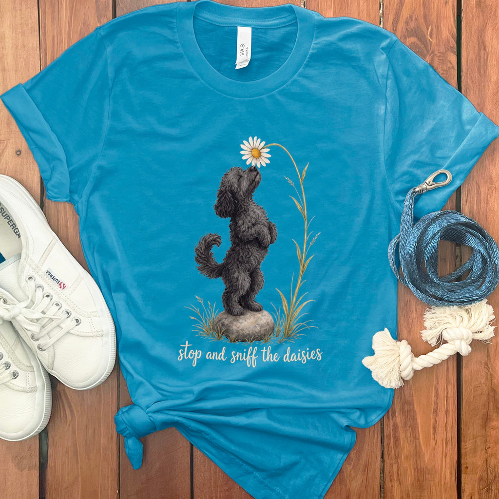 Black Goldendoodle Sniff Daisies T-Shirt in Aqua / S by Puppy Jo