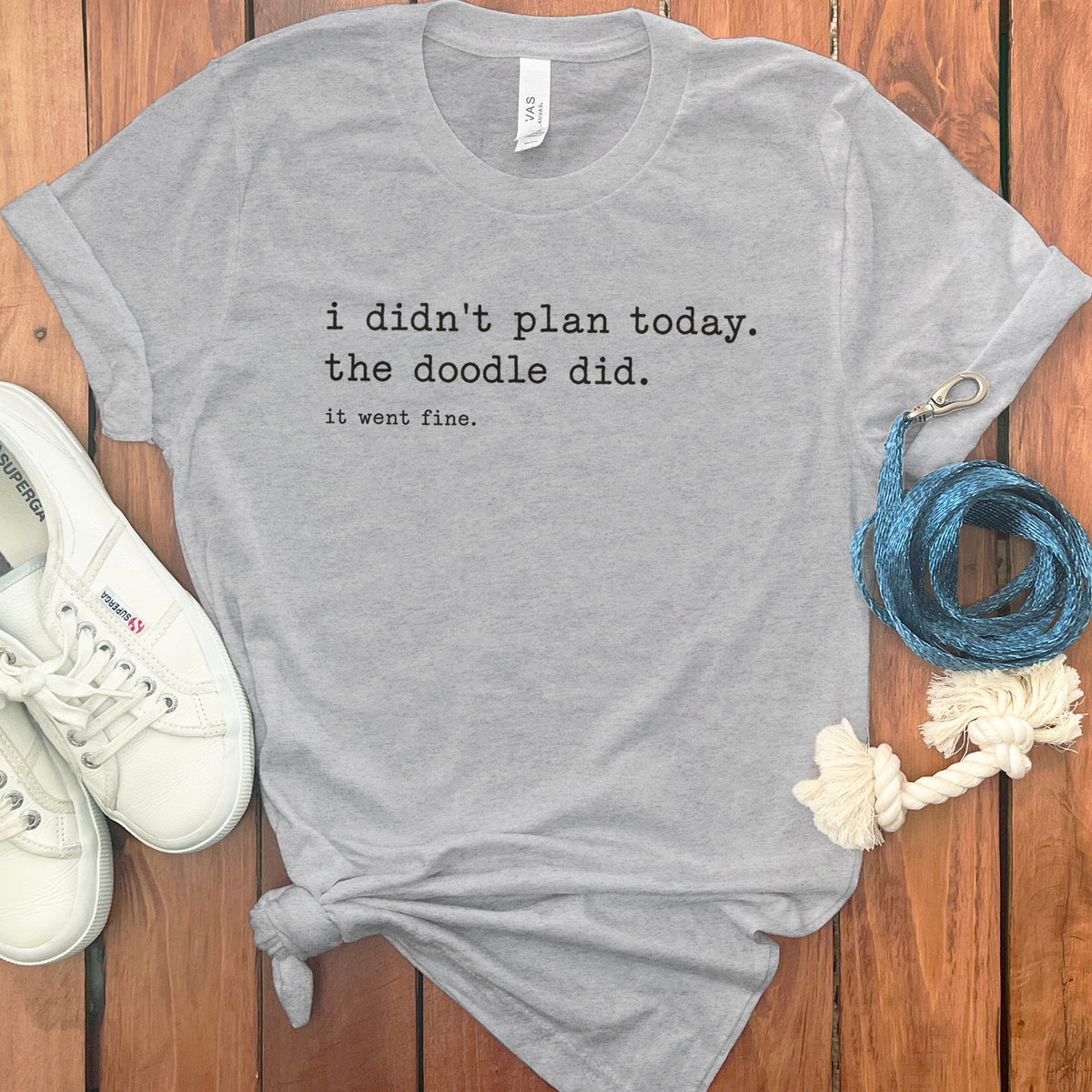 Grey t-shirt with text: "i didn't plan today. the doodle did. it went fine."