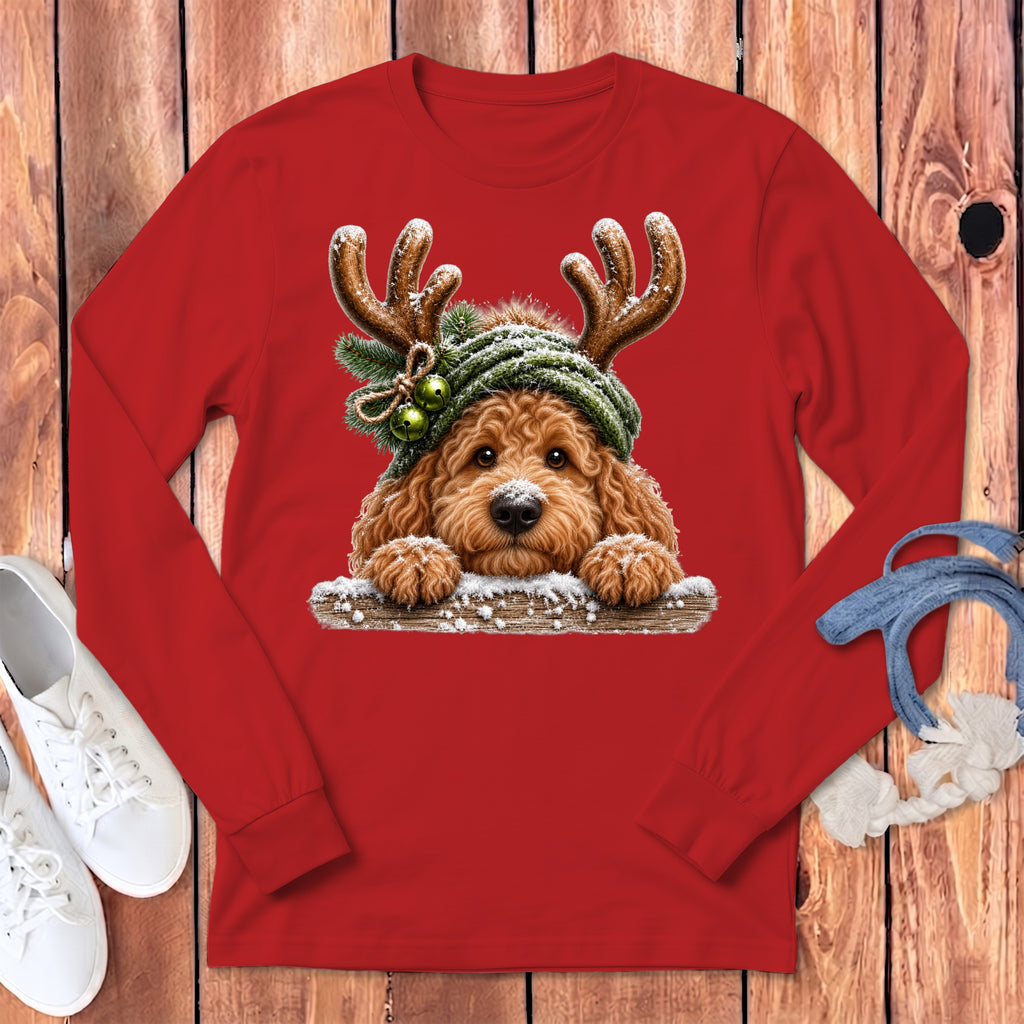Red long-sleeve shirt with a doodle dog wearing reindeer antlers and a snowy hat.