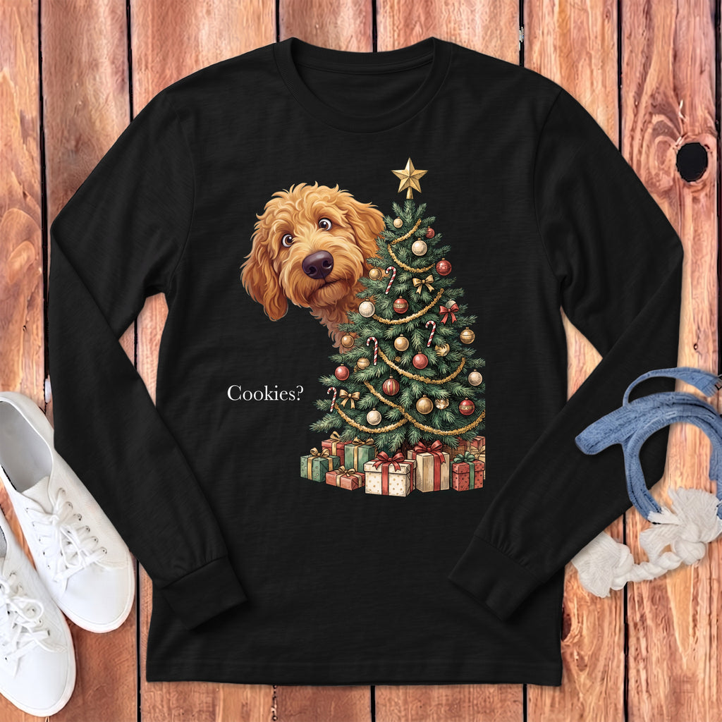 Golden doodle peeking behind a Christmas tree asking "Cookies?".