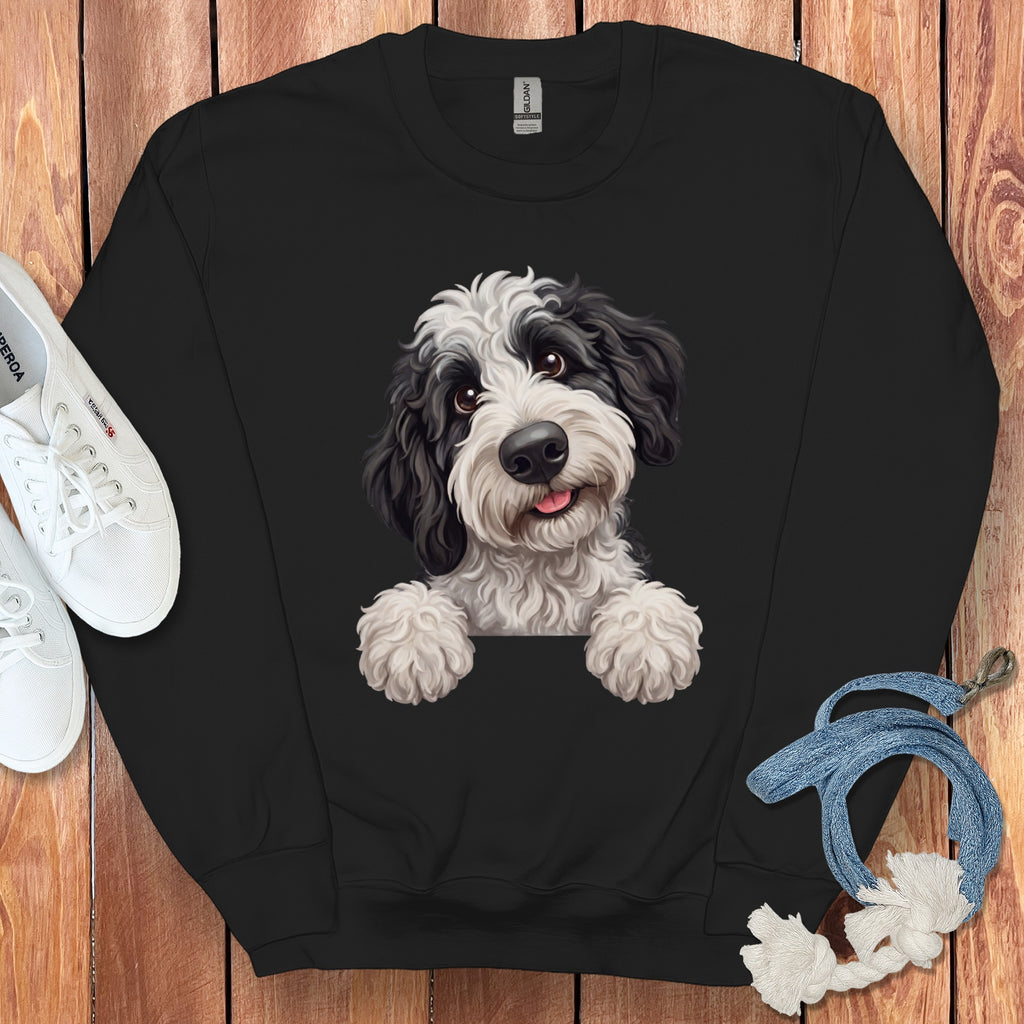 Black sweatshirt with a black and white dog illustration and a Gildan tag.