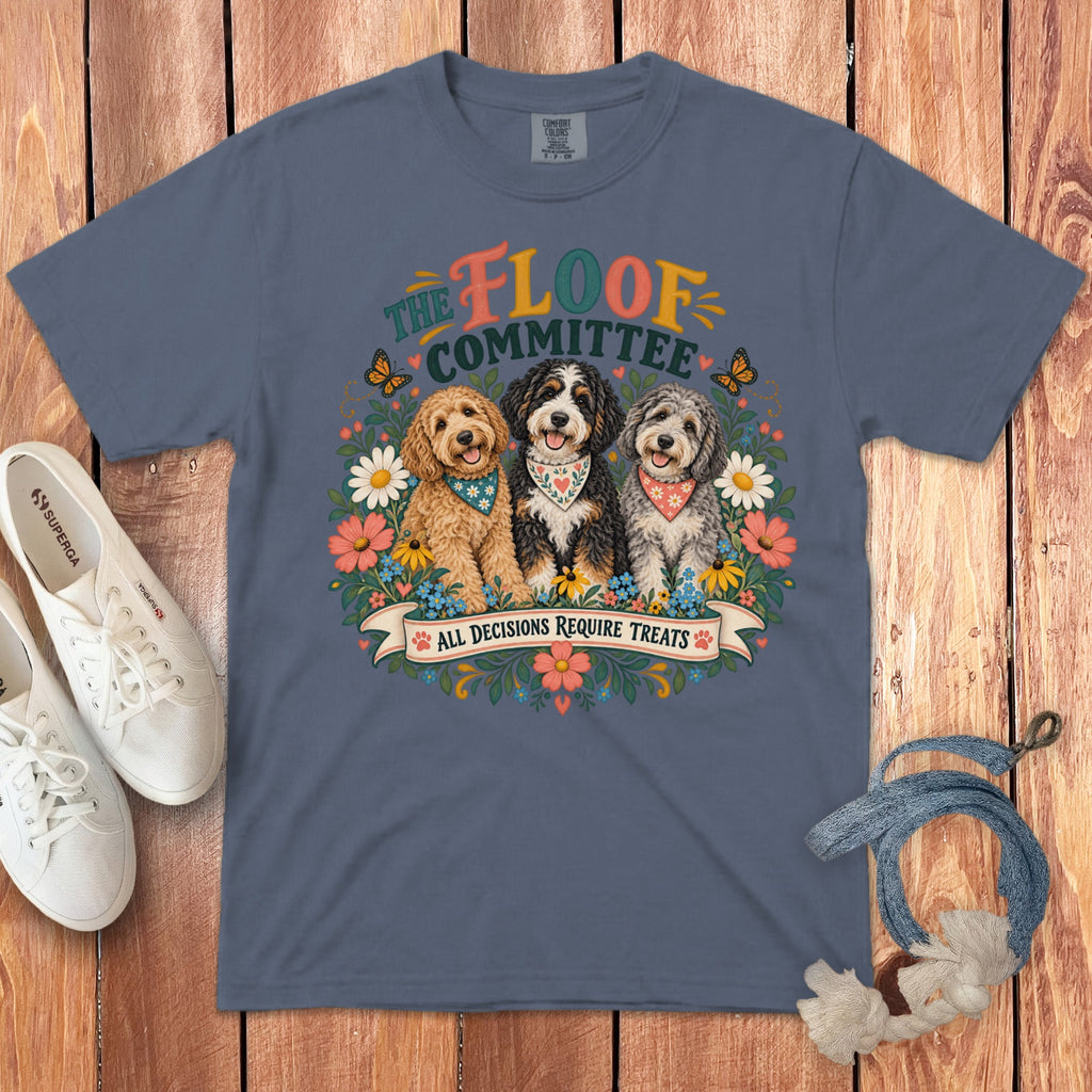 Three dogs with bandanas are featured with "The Floof Committee" text and "All Decisions Require Treats" banner.