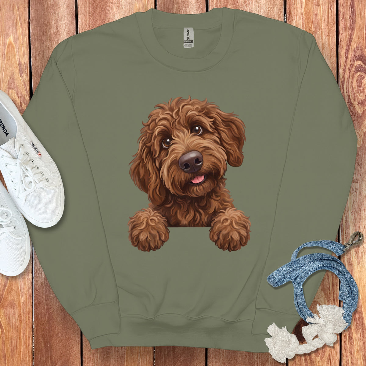 Olive green sweatshirt with a brown doodle dog graphic.