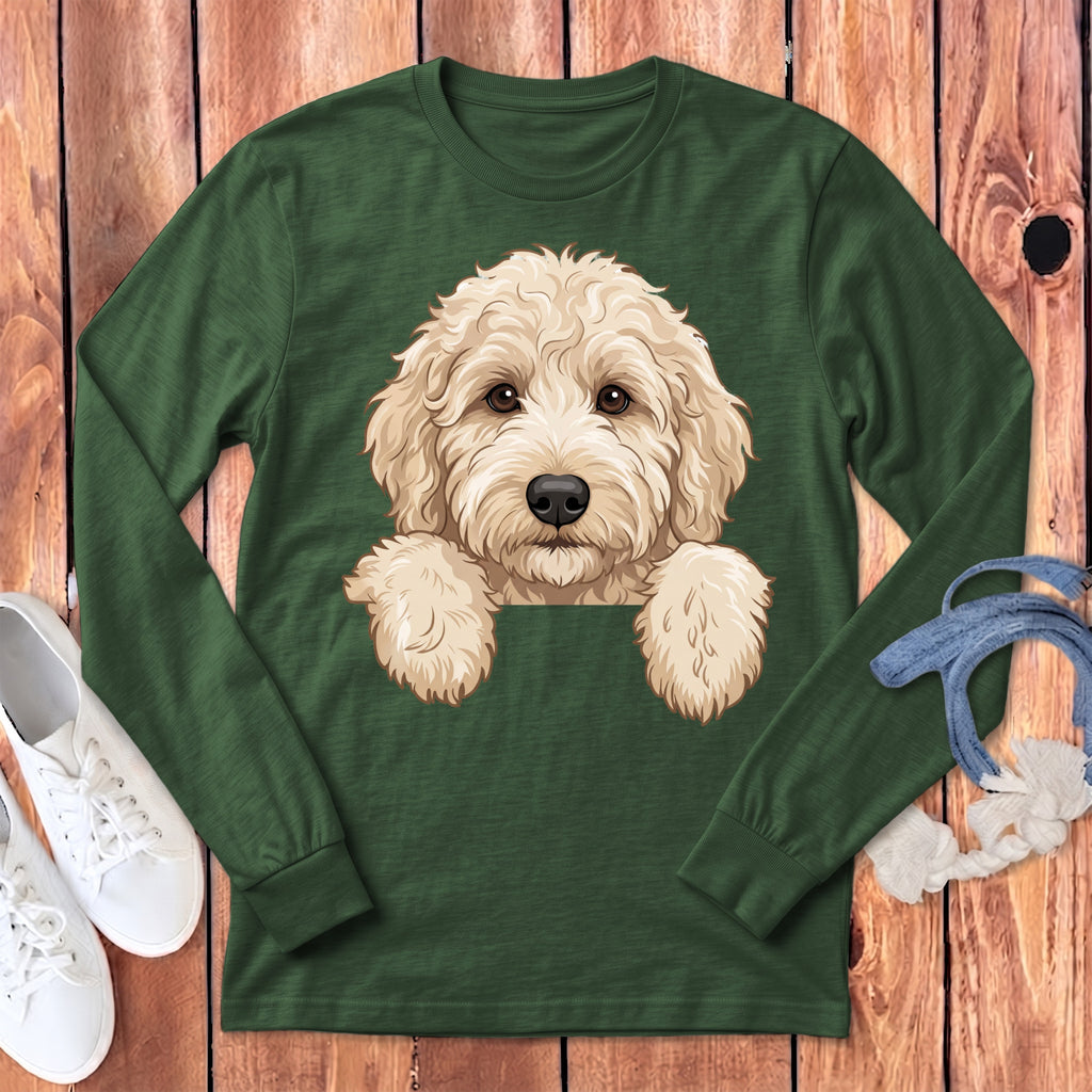 Green long-sleeve shirt with a cream-colored doodle dog illustration peeking over the chest.