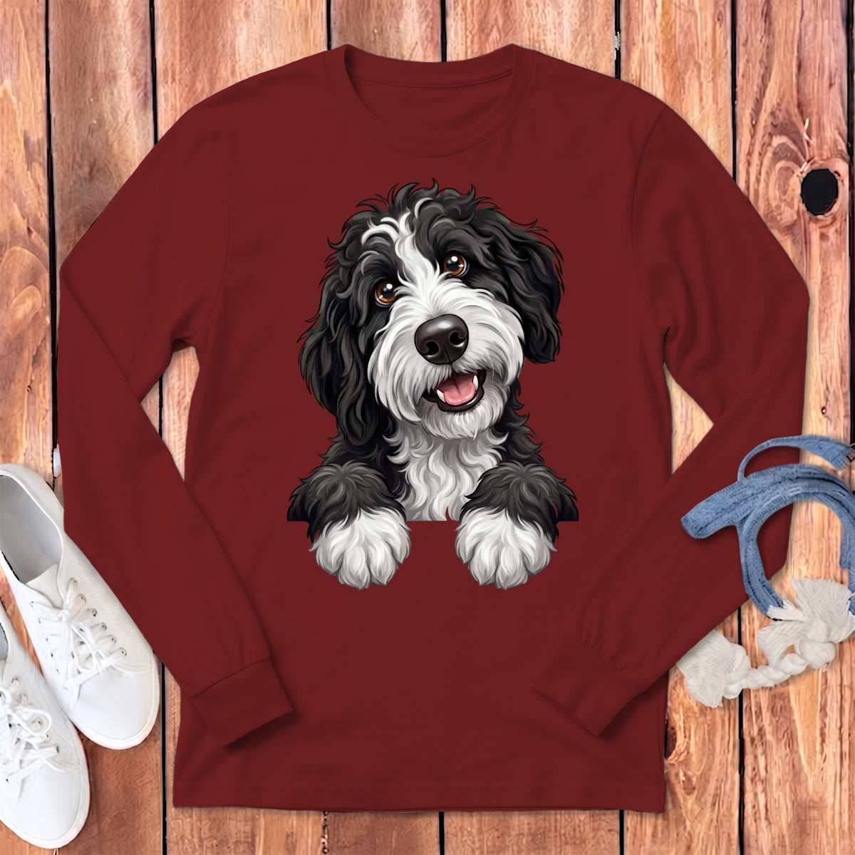 Long sleeve shirt with a black and white dog illustration.