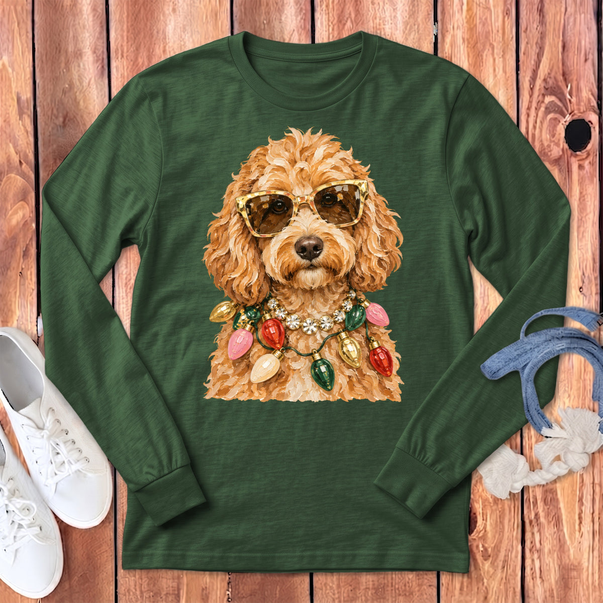 Green long-sleeve shirt with a dog wearing sunglasses and Christmas lights.